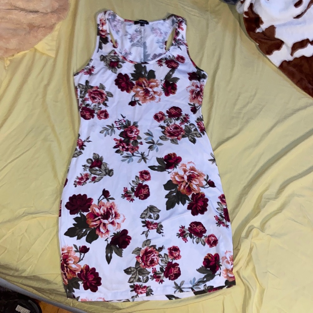 Fitted floral dress worn lightly